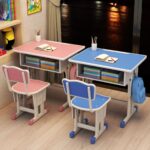 Kid's desk and chair set with adjustable chair and spacious desk surface, perfect for study and creative activities.