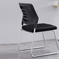 Ergonomic armless task chair with lumbar support, adjustable height, and smooth-rolling casters for comfort and mobility.