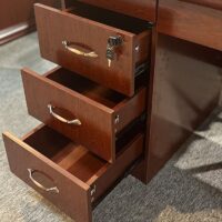 Adjustable office computer desk with a modern design, featuring height-adjustable functionality and a spacious work surface for an ergonomic workspace.