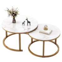 Pair of elegant marble tables with unique veining, featuring sleek metal bases.