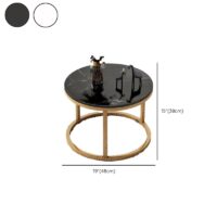 Pair of elegant marble tables with unique veining, featuring sleek metal bases.