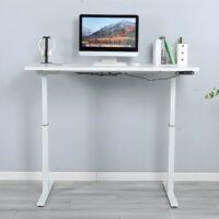 Home office height adjustable standing desk with a spacious surface and smooth electric lift mechanism.