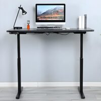 Home office height adjustable standing desk with a spacious surface and smooth electric lift mechanism.