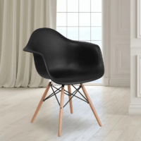 A stylish Bistro Home Chair with a sturdy metal or wood frame, curved backrest, and a sleek, minimalist design, perfect for indoor and outdoor spaces.