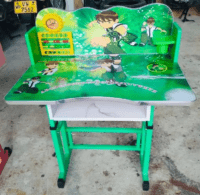 A colorful cartoon-themed kids' study desk with built-in storage, an ergonomic chair, and a spacious surface for learning and creative activities.