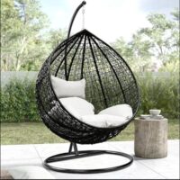 Cozy porch swing hammock made of durable, weather-resistant material, perfect for outdoor relaxation on a porch, patio, or garden.