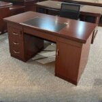 Adjustable office computer desk with a modern design, featuring height-adjustable functionality and a spacious work surface for an ergonomic workspace.