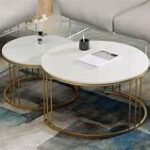 Luxurious marble round coffee table with a polished surface and sturdy metal or wooden base, perfect for modern and classic interiors.