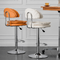 Modern faux leather alloy barstool with a cushioned seat, sturdy metal frame, adjustable height, and 360-degree swivel for stylish and comfortable seating.