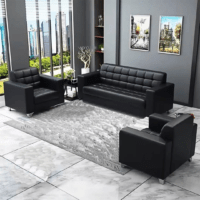 Black leather office lounge sofa with a sleek design, cushioned seating, and a sturdy frame for professional and reception spaces.