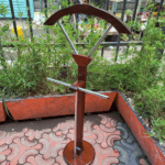 A sleek and durable Executive Coat Hanger with a sturdy frame, multiple hooks, and a stylish design, perfect for offices, lobbies, and upscale spaces.