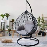 Cozy porch swing hammock made of durable, weather-resistant material, perfect for outdoor relaxation on a porch, patio, or garden.