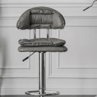 Modern faux leather alloy barstool with a cushioned seat, sturdy metal frame, adjustable height, and 360-degree swivel for stylish and comfortable seating.