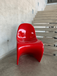 The Vitra Panton Eames Chair with a sleek, ergonomic design, molded construction, and a timeless aesthetic, perfect for modern and classic interiors.