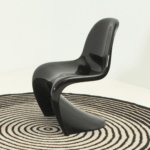 black panton chair, modern chair, sleek black chair, designer chair, verner panton chair, contemporary furniture, minimalist chair, sculptural chair, mid-century modern chair, stylish black chair, ergonomic chair, futuristic chair, monobloc chair, curved chair, glossy black chair, luxury seating, plastic chair, high-end chair, unique chair design, statement chair, black dining chair, artistic chair, elegant chair, one-piece chair, stackable chair, smooth chair design, bold black chair, curvy silhouette chair, danish design chair, famous chair design, lightweight chair, innovative seating, black glossy finish, timeless chair, wave-shaped chair, living room chair, chic black chair, artistic furniture, trendy chair, black accent chair, durable plastic chair, luxury black chair, sculpted seating, curvy modern chair, space-saving chair, seamless chair design, dining room chair, high-quality chair, museum-worthy chair, comfortable chair, iconic chair, futuristic black chair, avant-garde chair, aesthetic black chair, ergonomic seating, contemporary black furniture, high-end design, monochrome chair, glossy finish chair, smooth surface chair, unique silhouette, bold design chair, artful chair, modern home furniture, sophisticated chair, flowing shape chair, elegant black seating, black monobloc chair, single-molded chair, famous design chair, danish furniture design, collectible chair, space-age chair, innovative furniture, luxury dining chair, modernist chair, high-design seating, seamless modern chair, black home decor, futuristic seating, contemporary interior chair, office chair, high-end furniture piece, black furniture icon, creative chair design, one-piece molded chair, minimalist seating, sculptural black chair, flowing lines chair, cutting-edge furniture, plastic molded chair, black lounge chair, ultra-modern chair, space-saving furniture, stackable black chair, organic shape chair, durable seating, versatile chair, designer furniture, modern black decor, functional chair, high-end black chair, modern aesthetic chair, minimalist home decor, trendsetting chair, industrial black chair, matte black chair, glossy plastic chair, refined black chair, smooth black surface, artistic silhouette chair, ergonomic home chair, interior design chair, signature chair, museum collection chair, artistic design furniture, interior design icon, iconic furniture piece, timeless modern chair, mid-century classic chair, mod black chair, ultra-sleek chair, sculpted plastic chair, furniture masterpiece, organic design chair, molded seat chair, artistic seating, futuristic interior design, space-age furniture, high-end home decor, contemporary black accent, stylish dining chair, sleek office chair, gallery-worthy chair, innovative chair concept, fluid chair design, home decor essential, modern classic chair, fashionable seating, functional art chair, iconic mid-century chair, artistic black decor, famous furniture piece, mod-inspired chair, curved silhouette, smooth wave chair, museum-worthy furniture, flowing modern design, sculpted plastic seating, glossy black finish, industrial chic chair, perfect black chair, luxury home chair, posh black chair, premium design chair, sleek sculpted chair, furniture design classic, showpiece chair, dramatic black chair, versatile black chair, distinctive chair, futuristic decor, aesthetic furniture, high-impact chair, lounge chair, ultra-modern interior piece, modernist furniture, stylish black seating, ergonomic plastic chair, dining set chair, luxury interior chair, contemporary lifestyle chair, art gallery chair, fluid form chair, art-inspired chair, contemporary home must-have, high-design chair, avant-garde black seating, must-have designer chair, artistic expression chair, trendsetting interior piece, modern luxury chair, eye-catching chair, monochrome furniture, cutting-edge home decor, ultra-sleek furniture, comfortable modern chair, timeless design furniture, modern home must-have, aesthetic decor piece, collector’s chair, Panton S chair, flowing form chair, black art furniture, one-piece plastic chair, premium black chair, black masterpiece, high-end minimalist chair, modern architectural chair, smooth stylish chair, single-form chair, collectible design, molded furniture, iconic home decor, fashion-forward furniture, gallery collection chair, sculptural form chair, architectural seating, seamless plastic chair, contemporary black masterpiece, black designer furniture, modern home essential, high-impact decor, ergonomic lifestyle chair, famous sculptural chair, must-have black furniture, posh contemporary chair, fine design chair, timeless interior piece, sculptural black furniture, design-forward chair, modern chair for interiors, statement furniture, luxury lifestyle chair, curvilinear furniture, dynamic shape chair, contemporary seating solution, classic black modern chair, artistic black home decor, black flowing chair, premium black design, black monoblock seating, futuristic home essential, artistic home decor, black elegance chair, ergonomic masterpiece, interior designer favorite, sought-after chair, smooth contoured chair, highly collectible chair, stylish modern seating, fluid modern furniture, Panton-inspired chair, trendsetting sculptural furniture, signature black piece, curved minimalist chair, modernist black chair, posh dining chair, contemporary artistic seating, striking chair design, museum chair, high-style furniture, revolutionary chair design, dramatic modern furniture, and more.