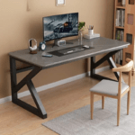 : Computer desk with bookshelf featuring a spacious work surface and built-in storage for an organized and efficient workspace.