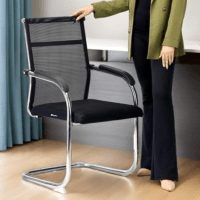 An ergonomic mesh office chair designed for comfort and support. The chair features a breathable mesh backrest to provide ventilation, promoting airflow and reducing heat buildup. The seat is cushioned with a plush, padded cushion that contours to the user’s body for enhanced comfort. Adjustable armrests allow for a customized sitting experience, and the seat height is also adjustable, accommodating various user heights. The chair has a tilt function, allowing for a smooth recline, providing ergonomic support during long hours of sitting. A sturdy, five-point base ensures stability, with smooth-rolling casters for easy mobility across different floor types. The sleek, modern design blends well with contemporary office spaces. Ideal for long working sessions, this chair combines form and function to improve posture and reduce discomfort. The mesh material offers durability while maintaining a lightweight feel, making it perfect for both home and professional office environments.