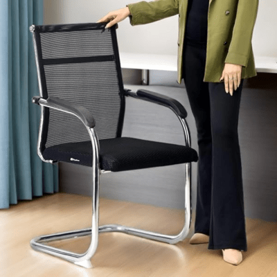 An ergonomic mesh office chair designed for comfort and support. The chair features a breathable mesh backrest to provide ventilation, promoting airflow and reducing heat buildup. The seat is cushioned with a plush, padded cushion that contours to the user’s body for enhanced comfort. Adjustable armrests allow for a customized sitting experience, and the seat height is also adjustable, accommodating various user heights. The chair has a tilt function, allowing for a smooth recline, providing ergonomic support during long hours of sitting. A sturdy, five-point base ensures stability, with smooth-rolling casters for easy mobility across different floor types. The sleek, modern design blends well with contemporary office spaces. Ideal for long working sessions, this chair combines form and function to improve posture and reduce discomfort. The mesh material offers durability while maintaining a lightweight feel, making it perfect for both home and professional office environments.
