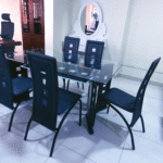 6-seater dining table, dining table for six, six person dining table, family dining table, wooden 6-seater table, rectangular dining table, modern dining table, contemporary 6-seater table, classic dining table, solid wood dining table, spacious dining table, large dining table, kitchen table for 6, elegant dining table, durable dining table, stylish 6-seater table, dining table with chairs, compact 6-person table, luxury dining table, minimalist dining table, rustic 6-seater table, farmhouse dining table, glass top dining table, metal dining table, traditional dining table, home dining furniture, dining set for six, long dining table, wide dining table, dining table with bench, oak dining table, marble top dining table, extendable 6-seater table, folding dining table, dining table centerpiece, family meal table, heavy-duty dining table, dining furniture set, dinner table for six, polished wood table, rectangular table for six, sleek dining table, dining room table, functional 6-seater table, mid-century modern table, Scandinavian dining table, industrial style table, durable wood table, acacia wood table, walnut dining table, glossy finish dining table, matte finish dining table, 6-seat capacity table, modern home dining table, space-saving dining table, formal dining table, casual dining table, decorative dining table, everyday use dining table, entertaining table for six, breakfast table for six, kitchen eating table, functional home table, multi-use dining table, comfortable seating table, designer 6-seater table, trendy dining table, stylish rectangular table, symmetrical dining table, symmetrical 6-seat table, artistic dining table, balanced dining set, ergonomic dining table, handcrafted dining table, precision-built table, family gathering table, celebration table, dinner hosting table, dining table for guests, practical dining table, robust 6-seater, strong dining surface, symmetrical shape table, clean line design table, family-friendly dining table, dining solution for families, cozy 6-seater table, compact dining arrangement, warm dining setup, inviting dining table, handcrafted wood table, artisan crafted table, 6-person tabletop, flat surface dining table, smooth surface table, elegant 6-person table, symmetrical shape table, dining room essential, home dining essential, dining furniture, large rectangular table, symmetrical seating table, even-spaced dining table, built for six people, uniform seating table, comfortable dining arrangement, large dining furniture, family-sized dining table, social dining table, dining set centerpiece, table for big family, 6-seat formal table, contemporary wood table, premium 6-seater table, polished surface table, sturdy dining table, 6-seater table frame, table for six meals, family mealtime table, evening meal table, large capacity dining, six spot dining table, aesthetic dining table, architectural dining table, heavy build dining table, elevated dining furniture, modern home table, quality wood dining table, classic wood grain table, unique design table, trendy home furniture, matching dining chairs, dining room seating table, cozy dining furniture, smooth edge table, soft corner dining table, rectangular six-chair table, contemporary six-person table, sharp edge dining table, long surface dining, dining room focal point, natural wood grain table, stylish wood tone table, dark wood dining table, light wood dining table, engineered wood table, sustainable wood table, eco-friendly dining table, table with sturdy legs, pedestal base table, four-legged table, sleek table top, edge beveled table, scratch-resistant table, heat-resistant surface table, chip-resistant table, weather-resistant indoor table, refined dining table, classy dining furniture, table for special occasions, weekend dinner table, symmetrical arrangement table, seating table for socializing, warm family meals table, symmetrical frame design, balanced leg table, comfort dining layout, uniform finish dining table, elegant symmetrical shape, living space table, rectangular 6-seat furniture, evening family table, hosting-friendly table, hospitality dining table, smart design table, rectangular family table, event hosting table, indoor 6-seater table, premium dining set, matching table and chair set, ergonomic tabletop, smart seating layout, sociable table setup, beautiful wood pattern table, geometrical symmetry table, reinforced leg structure, premium top finish table, scratch-free finish dining table, easy to clean table, lifestyle-friendly table, high-capacity dining surface, built for entertaining, aesthetic balance table, dining harmony table, modern family table, rectangular eating table, uniform dimensions table, symmetrical dinner table, large mealtime table, structured tabletop, elegant edge dining table, linear design table, detailed finish dining table, symmetrical wood dining, straight line table design, sculptural dining table, refined silhouette table, modern family furniture, aesthetic home furniture, everyday dining piece, large rectangular top, generous surface table, family-oriented dining, host-ready dining table, symmetrical corner table, square-edge dining, perfect proportions table, thoughtfully designed table, crafted for comfort table, symmetrical layout for dining, symmetrical leg spacing, neat rectangular table, compact yet spacious table, inviting table design, social meal table, togetherness dining furniture, rectangular socializing table, consistent design table, uniform layout table, family-oriented design table, versatile use table, adjustable height table, meal-centric furniture, dinner party table, intimate gathering table, home-hosting dining table, indoor eating surface, dining for six comfortably, stable leg structure, reinforced frame dining table, crafted from hardwood, hand-polished finish, maintenance-free surface, seamless finish table, symmetrical rectangular slab, home enhancement furniture, eat-in kitchen table, 6-seat layout dining, family size furniture, classic rectangular shape, rectangular design centerpiece, table for get-togethers, table for shared meals, comfortable height dining table, harmonious design table, tasteful dining decor, home style dining, attractive wood table, artistic dining surface, flat dining slab, 6-place seating table, versatile family table, space-efficient 6-seater, room centerpiece table, built to seat six, meeting-friendly table, stylish entertaining table, flat edge wood table, panel style dining table, timeless design table, group seating table, flat panel top table, rectangular utility table, multipurpose table, sleek modern surface, rectangular slab dining table, kitchen dining surface, interior dining furniture, communal eating table, guest hosting table, minimalist modern table, minimalistic design dining, designer wood table, popular dining table style, rectangular dining piece, contemporary host table, socializing surface, formal dinner table, home gathering table, day-to-day dining table, signature dining design, practical table for six, built-in balance table, lifestyle piece furniture, centerpiece for dining room, open layout table, standard 6-person table, modular dining setup, symmetrical wood panel, heavy top surface, stylish utility furniture, smooth finish furniture, long-term use dining table, everyday dining solution, popular dining choice, feature dining table, smart home dining table, timeless elegance table, crafted home piece, beautiful dining surface, eat together table, 6-seater table layout, consistent table design, classic home piece, rectangular meal space, rectangular family-friendly table, symmetrical rectangle slab, thick tabletop dining table, minimal furniture piece, formal eating table, social setup dining table, home harmony furniture, rectangular top table, wood detail dining table, rectangular balance table, dining comfort centerpiece, clean look dining table, minimal grain wood table, symmetrical space distribution, wide layout table, easy-assembly dining table, compact layout furniture, sturdy symmetrical dining, 6-person table arrangement, symmetrical eating surface, architectural dining form, rectangular furniture centerpiece, cohesive table design, artistic grain table, unified dining table design, neat layout dining, ergonomic surface table, high-utility furniture, dining flow table, modern family meal space, rectangular hospitality piece, rectangular dinner surface, edge-aligned dining table, sectional family table, rectangular gathering space, table with six matching chairs, centerpiece for open plan kitchen, table for daily dining, sleek edge finish, proportional dining table, eye-catching tabletop, edge-finished slab, uniform design lines, rectangular entertaining furniture, balanced proportions table, large symmetrical dining set, evening dinner furniture, modern rectangular furniture, neat geometry dining table.