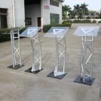 stage podium, podium for stage, stage podium stand, podium stand for stage, podium for events, event podium, speaking podium, speaker podium, presentation podium, lecture podium, lectern podium, podium lectern, wooden stage podium, metal stage podium, acrylic stage podium, transparent podium, clear acrylic podium, glass podium stand, modern stage podium, professional podium stand, premium podium, luxury podium stand, designer podium, portable stage podium, lightweight podium, movable podium, foldable podium, adjustable podium, height adjustable podium, podium with microphone stand, podium with mic holder, podium with sound system, podium with LED lights, podium with logo panel, podium with branding panel, podium with front panel, podium with shelf, podium with storage, podium with reading surface, podium with book rest, podium with cable management, podium with wheels, rolling podium, podium on castors, heavy duty stage podium, stable podium stand, anti skid podium, indoor podium, outdoor podium, weather resistant podium, podium for conference, conference podium, seminar podium, classroom podium, school podium, college podium, university podium, teacher podium, training podium, corporate podium, office podium, business presentation podium, boardroom podium, auditorium podium, hall podium, church podium, religious podium, pulpit podium, mosque podium stand, temple podium, podium for worship hall, political podium, election podium, rally podium, public speaking podium, press conference podium, media podium, news podium, award ceremony podium, stage furniture podium, event furniture podium, exhibition podium, trade show podium, podium for product launch, podium for speeches, podium for announcements, podium for meetings, podium for debates, podium for lectures, podium for functions, podium for ceremonies, podium for seminars, podium for workshops, podium for presentations, podium for stage shows, podium for live events, podium for indoor events, podium for outdoor events, podium for schools and colleges, podium for offices, podium for hotels, podium for banquet halls, podium for wedding stage, podium for receptions, podium for conferences and seminars, podium stand online, buy stage podium online, stage podium price, stage podium design, latest podium design, custom podium stand, branded podium stand, made to order podium, durable stage podium, long lasting podium stand, easy assembly podium, ready to use podium